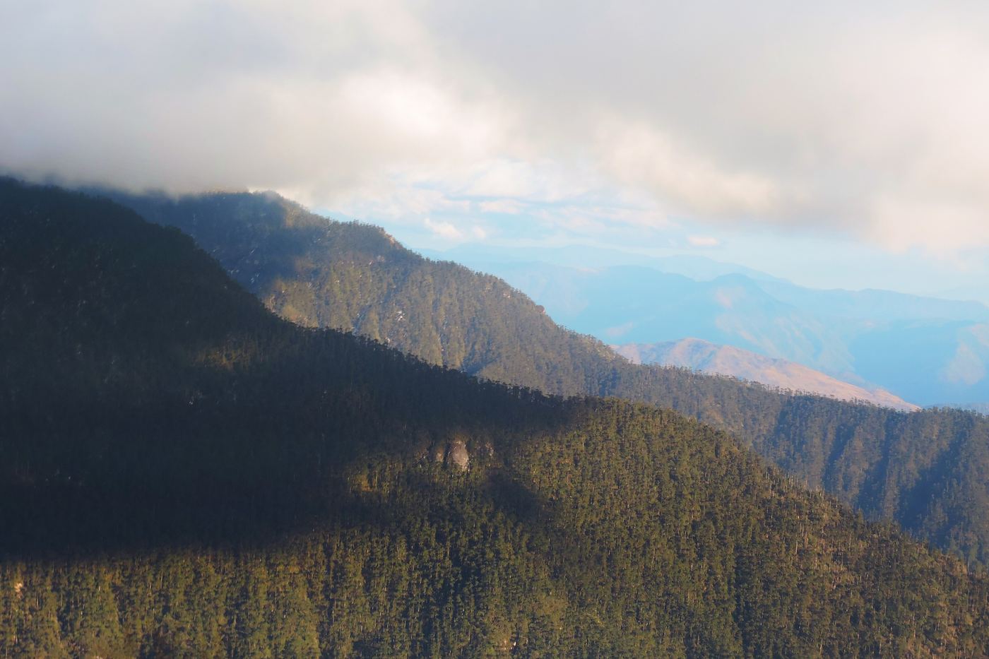 Layered blue ridges seen from Sela Pass
